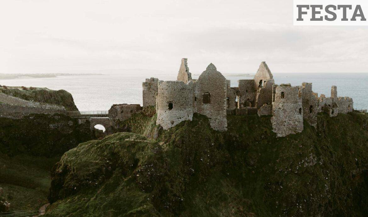 Explore the captivating ruins of Dunluce Castle overlooking the sea in Northern Ireland.